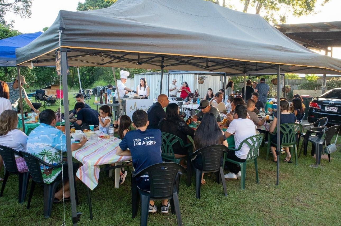A large outdoor Chef Miguel catering event with seated guests